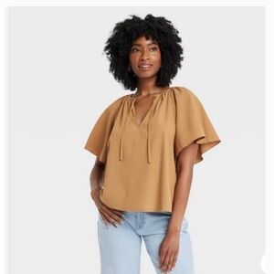 A New Day Flounce top sized S in Ochre
